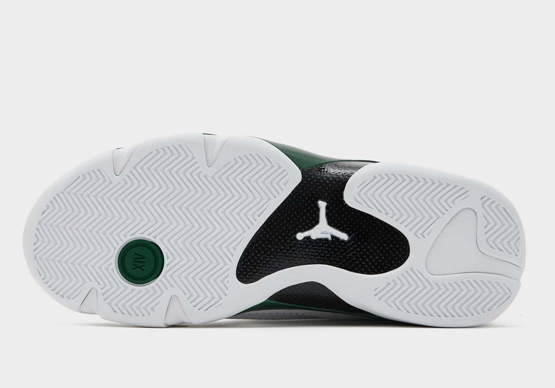 Suela del Air Jordan 14 Forest Green 2026 con la placa de fibra de carbono negra, el Jumpman y el detalle verde XIV