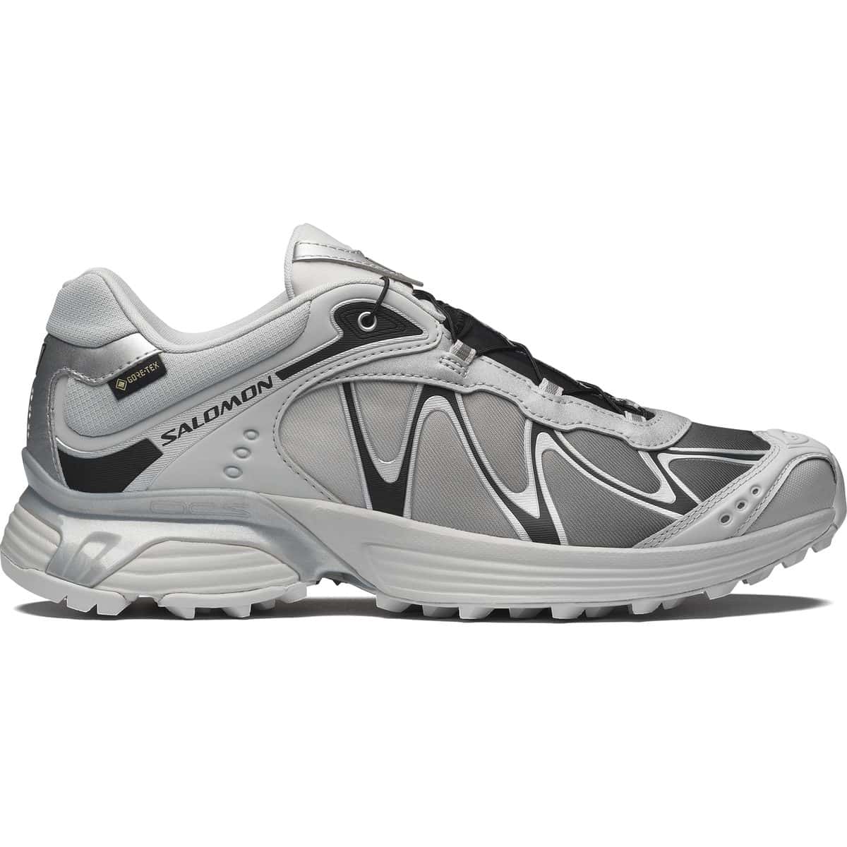 Salomon XT-Whisper GORE-TEX Gray Violet de perfil, con malla gris en degradé y apliques negros y plateados, sobre fondo blanco