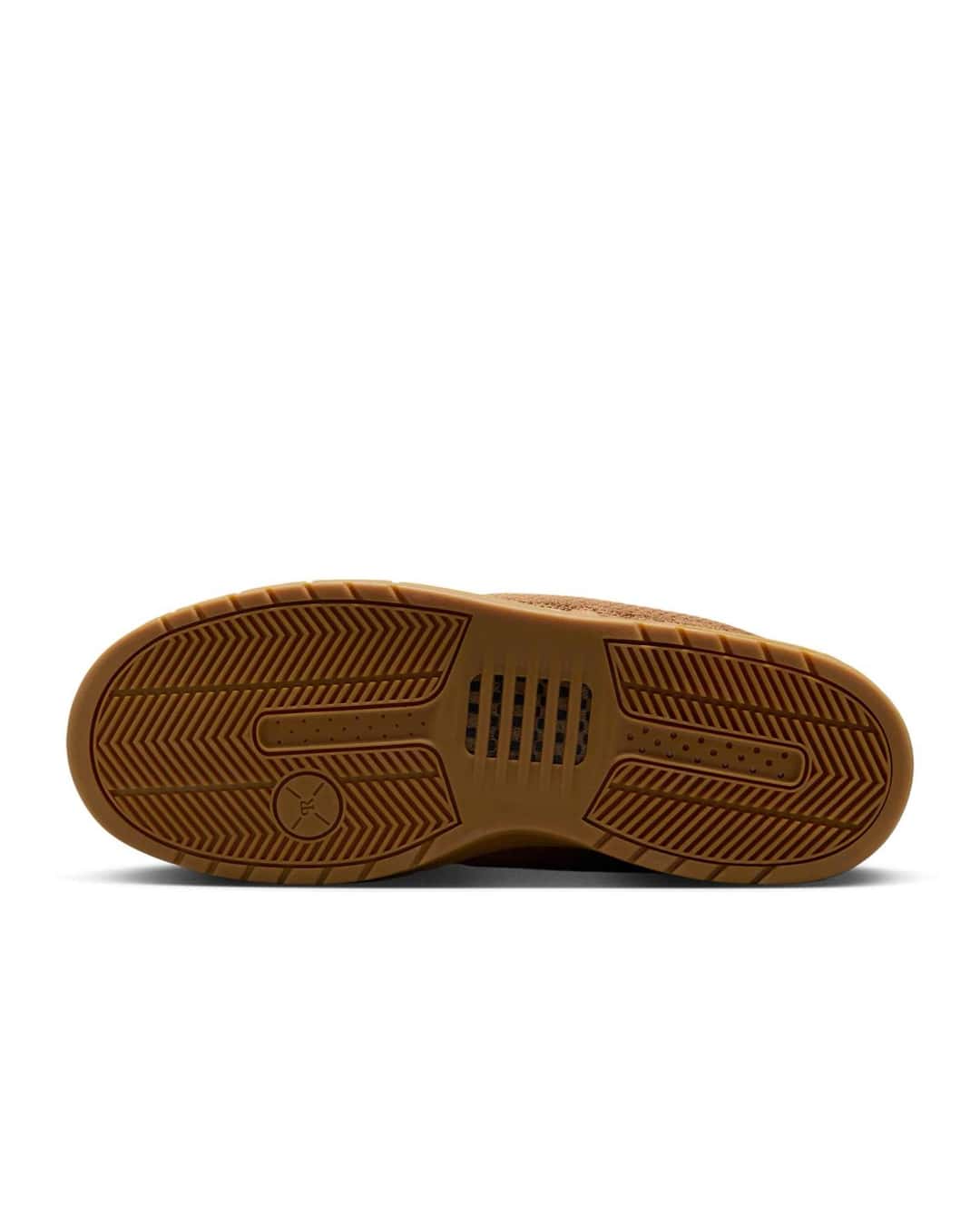 Suela del Nike SB P-Rod 1 Ale Brown en goma marrón miel, con dibujo de tracción en espiga, zona central ranurada y el pivote circular en la punta
