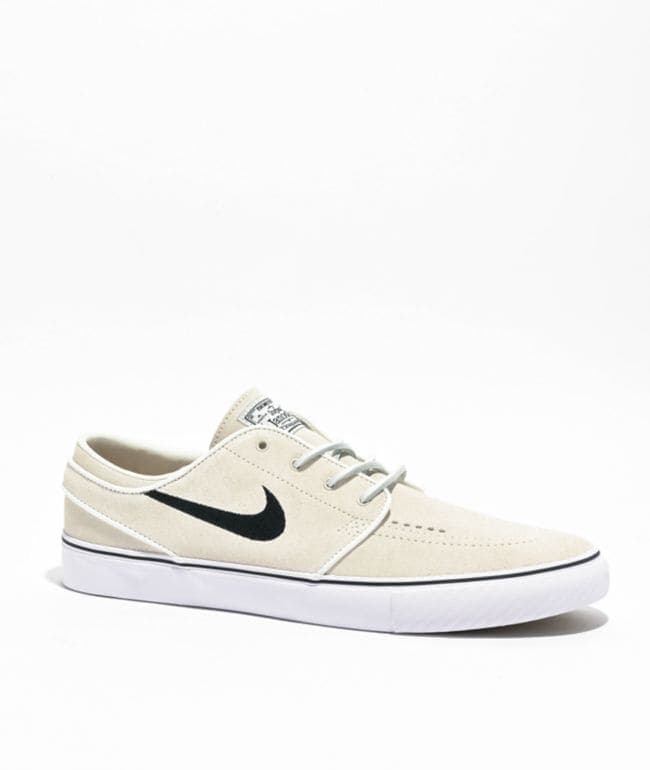 Zapatilla Nike SB Zoom Janoski OG+ de gamuza blanco hueso con swoosh negro y suela vulcanizada blanca